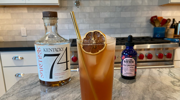 alcohol-free bourbon paloma mocktail with spiritless kentucky 74 non-alcoholic bourbon