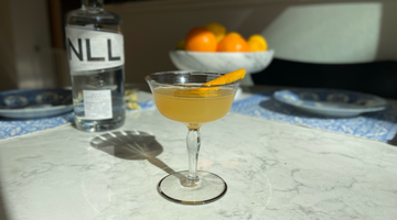 non-alcoholic orange marmalade breakfast martini mocktail with new london light alcohol-free gin alternative