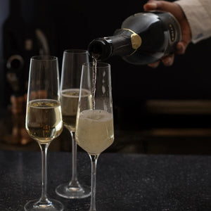 Pouring BOLLE Grand Reserve into champagne flutes